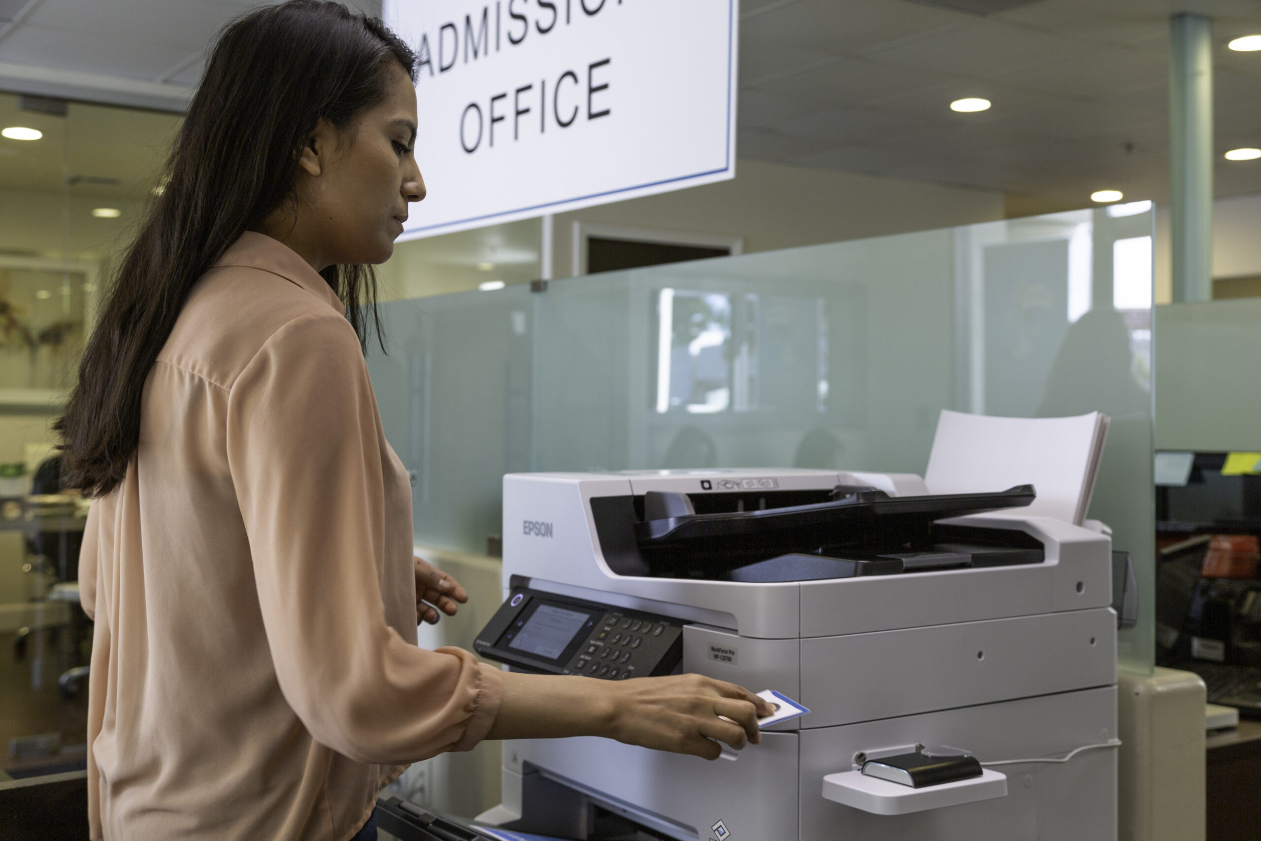 Woman Printing Documents from MFP